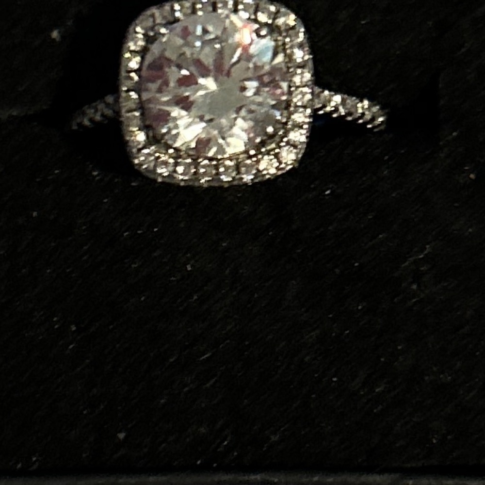 Elegant Sterling Silver and White Halo Ring